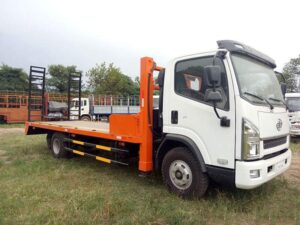 XE TẢI FAW 5.7 TẤN NÂNG ĐẦU CHỞ MÁY CHUYÊN DÙNG